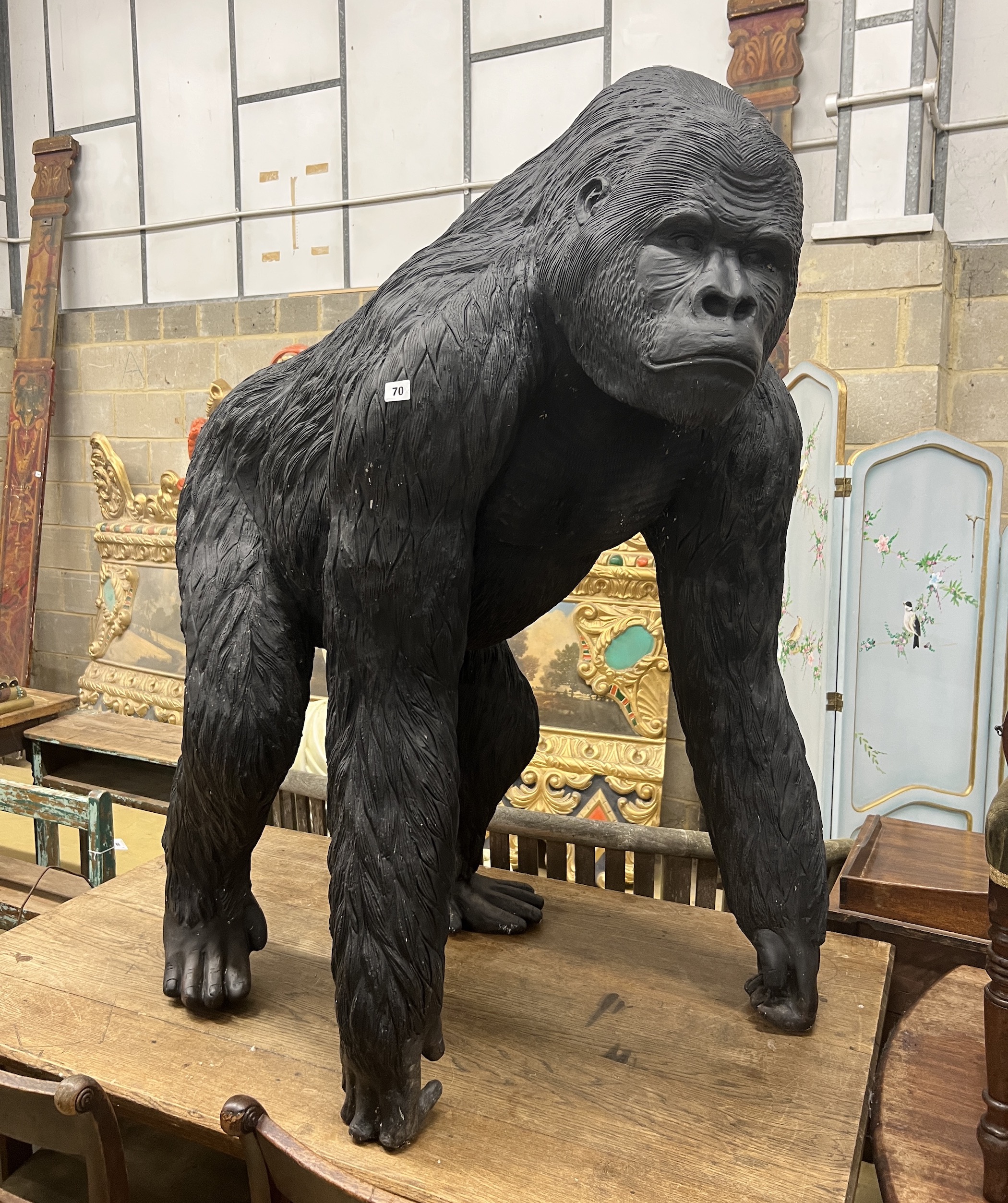 A life size composition gorilla garden ornament, height 126cm